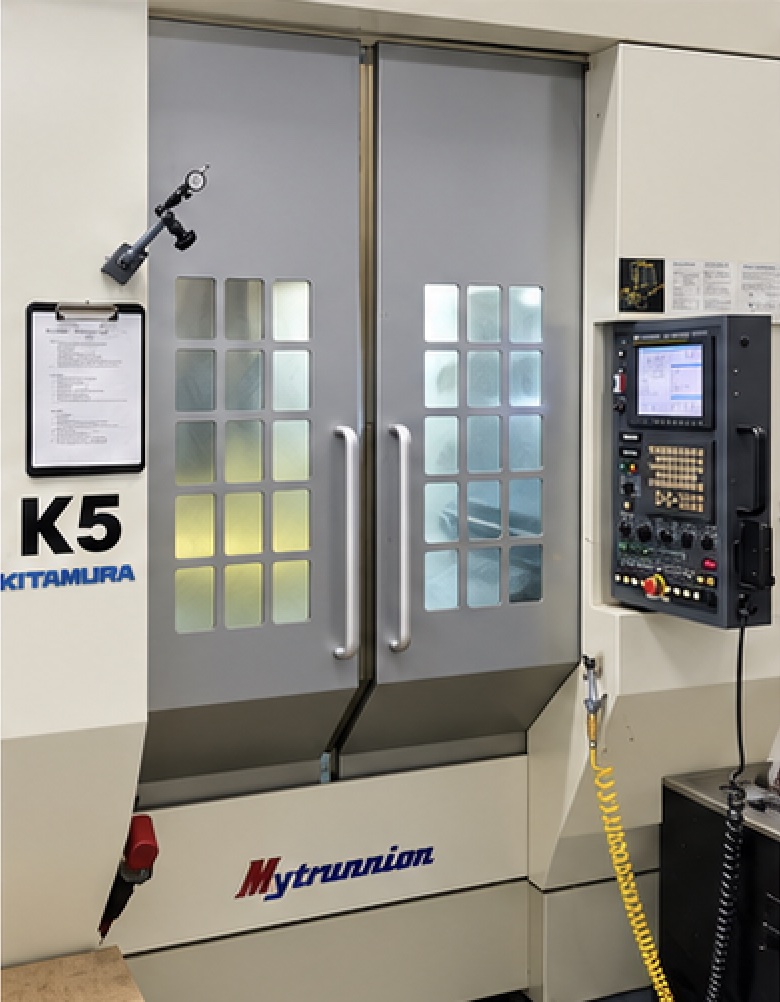 Kitamura Mytrunnion machining center with closed doors and control panel
